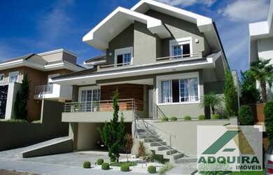 Imagem: A casa em condomínio possui 4 Dormitórios, 5 Banheiros, 4