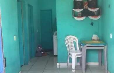 Imagem: A casa possui 2 Dormitórios e 1 Banheiro e está localizado