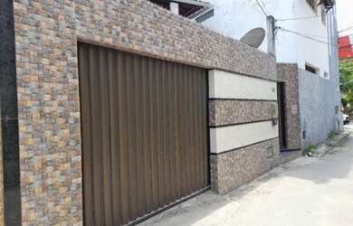 Imagem: A casa possui 2 Dormitórios, 2 Banheiros, 1 Vaga na garagem