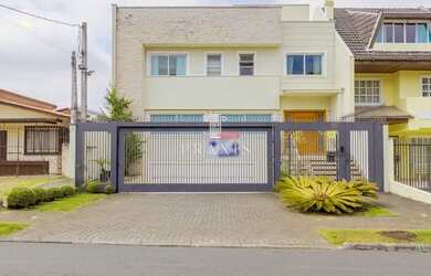 Imagem: A casa possui 4 Dormitórios, 5 Banheiros, 5 Vagas na garagem