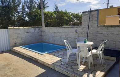 Imagem: A casa possui 2 Dormitórios, 1 Vaga na garagem e está localizado