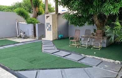 Imagem: A casa possui 3 Dormitórios, 4 Banheiros, 3 Vagas na garagem