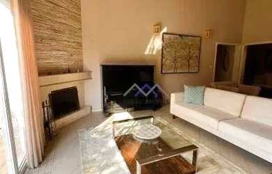 Imagem: A casa em condomínio possui 4 Dormitórios, 5 Banheiros, 296m²