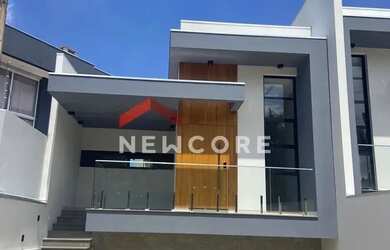 Imagem: A casa à venda possui 3 Dormitórios, 2 Banheiros, 2 Vagas