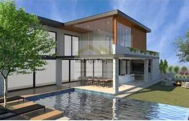 Imagem: A casa possui 5 Dormitórios, 5 Banheiros, 5 Vagas na garagem