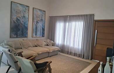 Imagem: A casa possui 3 Dormitórios, 5 Banheiros, 5 Vagas na garagem