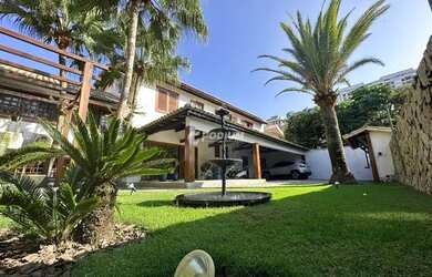 Imagem: A casa em condomínio à venda possui 5 Dormitórios, 5 Banheiros