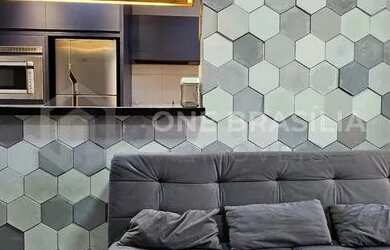 Imagem: O apartamento possui 1 Dormitório, 1 Banheiro, 1 Vaga na garagem