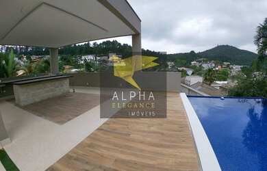 Imagem: A casa em condomínio possui 5 Dormitórios, 5 Banheiros, 5