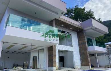 Imagem: A casa em condomínio possui 4 Dormitórios, 5 Banheiros, 5