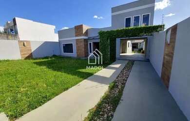 Imagem: A casa possui 3 Dormitórios, 3 Banheiros, 4 Vagas na garagem