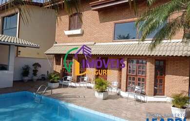 Imagem: A casa em condomínio possui 4 Dormitórios, 2 Banheiros, 2