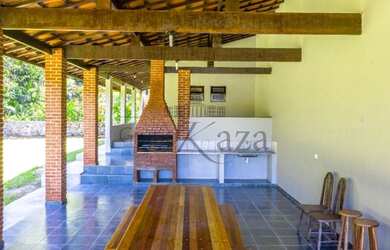 Imagem: A casa em condomínio possui 5 Dormitórios, 5 Banheiros, 5