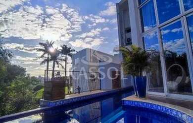 Imagem: A casa possui 4 Dormitórios, 5 Banheiros, 5 Vagas na garagem