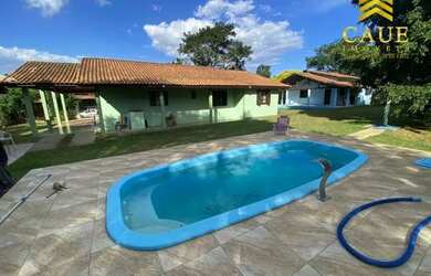 Imagem: A casa em condomínio à venda possui 5 Dormitórios, 5 Banheiros