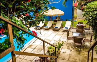 Imagem: A casa possui 3 Dormitórios, 2 Banheiros, 2 Vagas na garagem