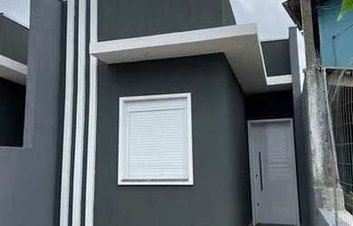 Imagem: A casa possui 2 Dormitórios, 1 Banheiro, 1 Vaga na garagem