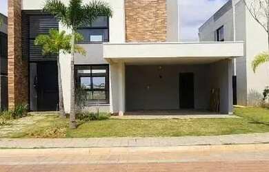 Imagem: A casa possui 4 Dormitórios, 5 Banheiros, 4 Vagas na garagem