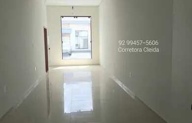 Imagem: A casa possui 3 Dormitórios, 2 Banheiros, 2 Vagas na garagem