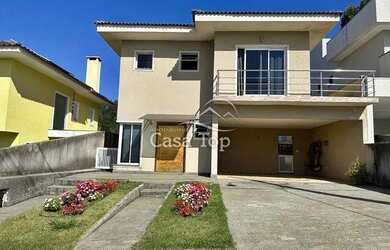 Imagem: A casa possui 3 Dormitórios, 4 Banheiros, 2 Vagas na garagem