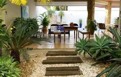 Imagem: A casa em condomínio possui 3 Dormitórios, 3 Banheiros e 420m²