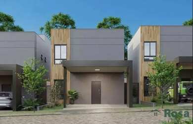 Imagem: A casa possui 3 Dormitórios, 2 Banheiros, 2 Vagas na garagem