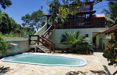 Imagem: A casa em condomínio possui 4 Dormitórios, 4 Banheiros, 2