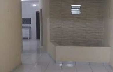 Imagem: A casa possui 3 Dormitórios, 2 Banheiros, 4 Vagas na garagem