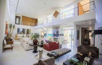 Imagem: A casa em condomínio possui 5 Dormitórios, 5 Banheiros, 4