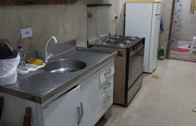 Imagem: A casa possui 2 Dormitórios, 4 Vagas na garagem e está localizado