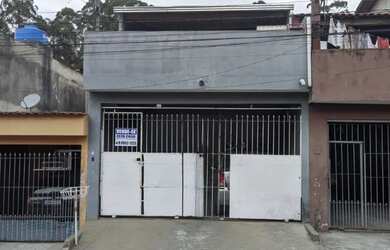 Imagem: A casa possui 5 Dormitórios, 2 Banheiros, 2 Vagas na garagem