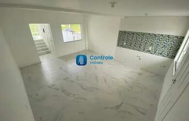 Imagem: A casa possui 2 Dormitórios, 3 Banheiros, 2 Vagas na garagem