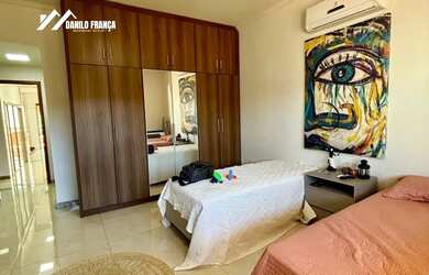 Imagem: A casa possui 3 Dormitórios, 5 Banheiros, 4 Vagas na garagem