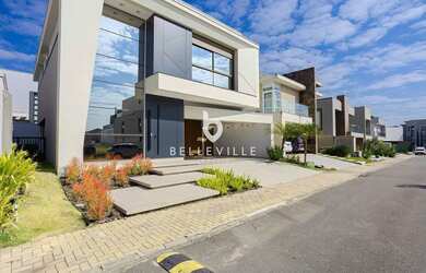 Imagem: A casa em condomínio possui 4 Dormitórios, 5 Banheiros, 2