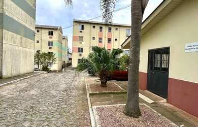 Imagem: O apartamento possui 2 Dormitórios, 1 Banheiro, 1 Vaga na garagem