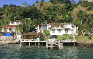 Imagem: A casa possui 5 Dormitórios, 5 Banheiros, 5 Vagas na garagem