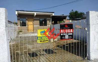 Imagem: A casa possui 2 Dormitórios, 1 Banheiro, 2 Vagas na garagem