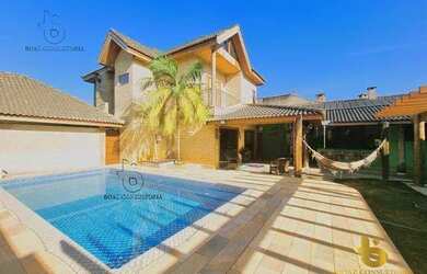 Imagem: A casa em condomínio à venda possui 4 Dormitórios, 5 Banheiros