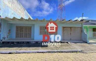 Imagem: A casa possui 5 Dormitórios, 2 Banheiros, 2 Vagas na garagem