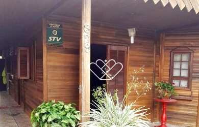 Imagem: A casa possui 3 Dormitórios, 3 Banheiros, 312m² de Área e