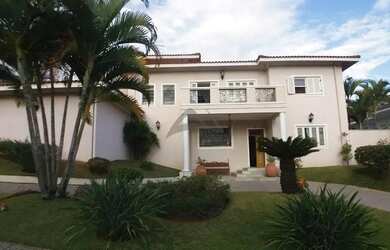 Imagem: A casa em condomínio possui 5 Dormitórios, 5 Banheiros, 5