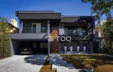 Imagem: A casa em condomínio possui 4 Dormitórios, 5 Banheiros, 4