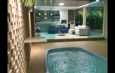 Imagem: A casa em condomínio possui 5 Dormitórios, 5 Banheiros, 2