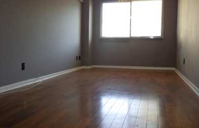 Imagem: A kitnet à venda possui 1 Dormitório, 1 Banheiro, 1 Vaga na