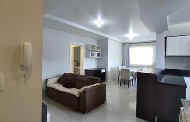 Imagem: O apartamento possui 3 Dormitórios, 1 Banheiro, 2 Vagas na