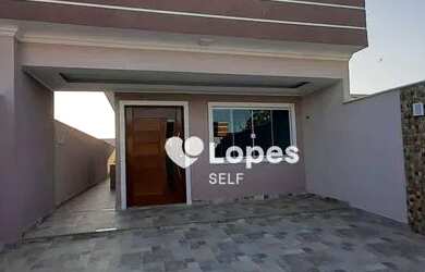 Imagem: A casa possui 3 Dormitórios, 3 Banheiros, 2 Vagas na garagem