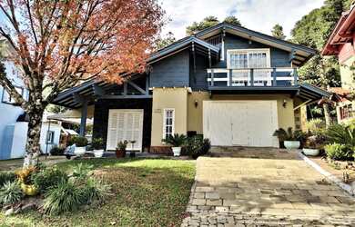 Imagem: A casa possui 5 Dormitórios, 4 Banheiros, 2 Vagas na garagem