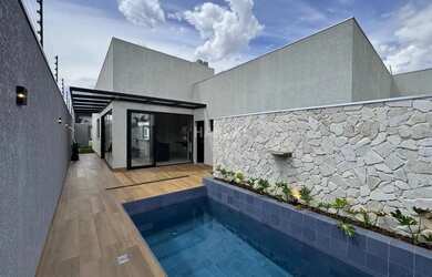 Imagem: A casa possui 3 Dormitórios, 5 Banheiros, 3 Vagas na garagem