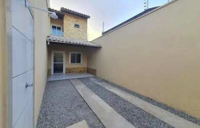 Imagem: A casa possui 3 Dormitórios, 3 Banheiros, 3 Vagas na garagem