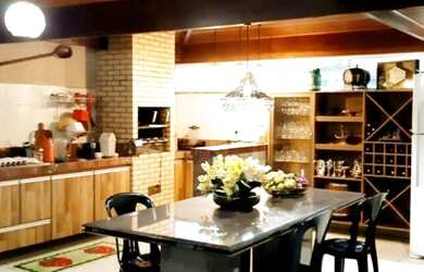 Imagem: A casa em condomínio possui 3 Dormitórios, 3 Banheiros, 4